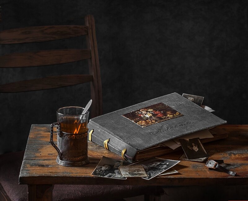 Photo Album on Wooden Table