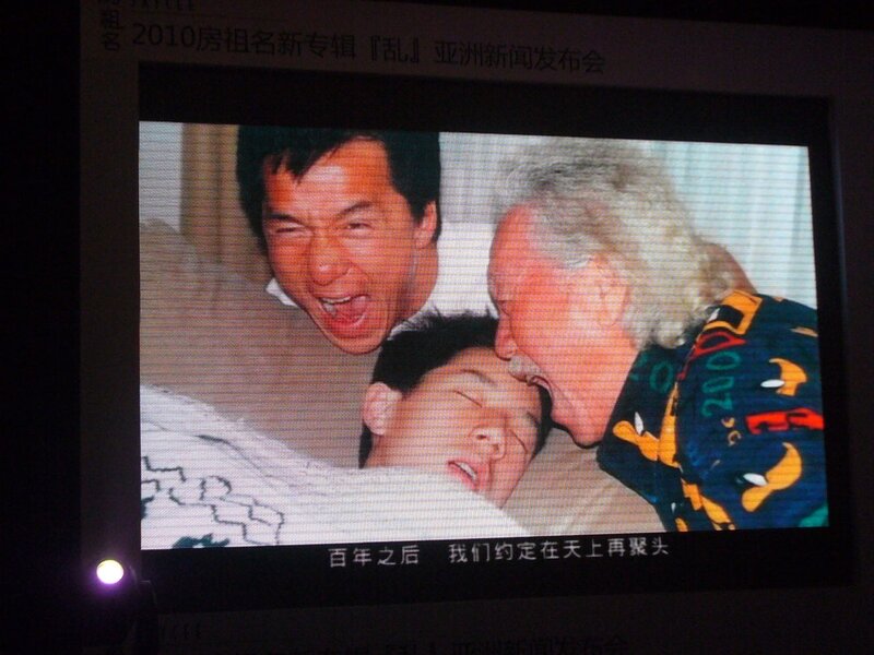 photo of three men on screen