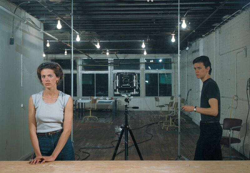 Photographer and model in studio