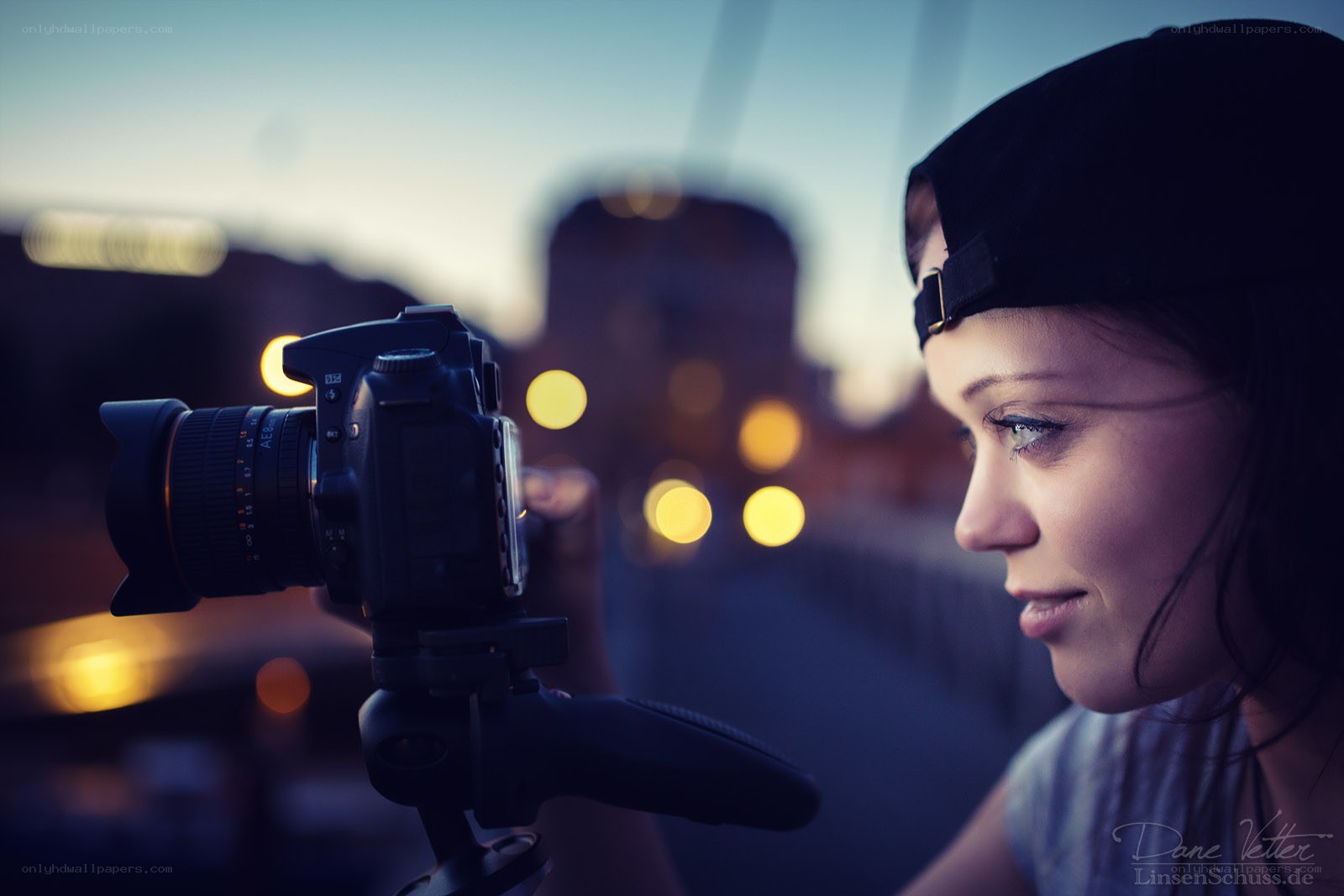Photographer at dusk with camera