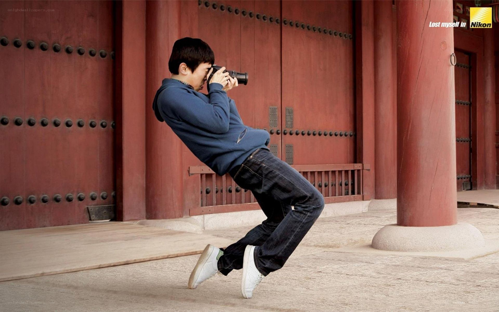 Photographer at historic gate