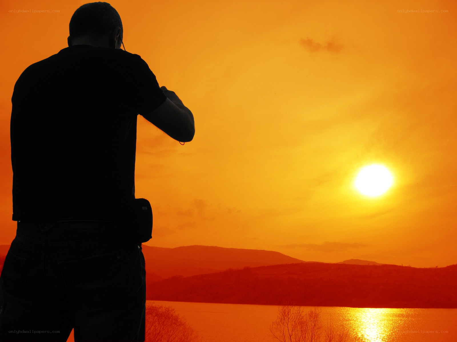 Photographer at sunset