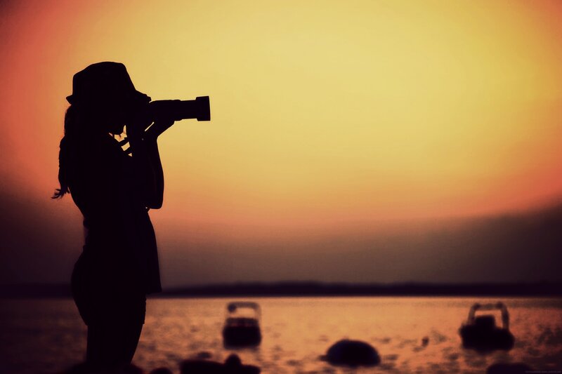 Photographer at sunset