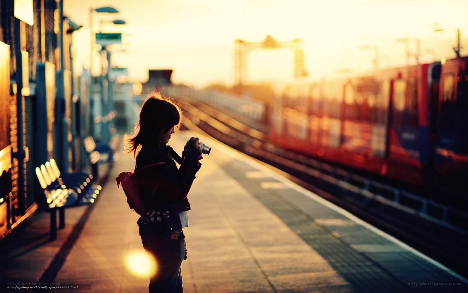 Photographer at train station