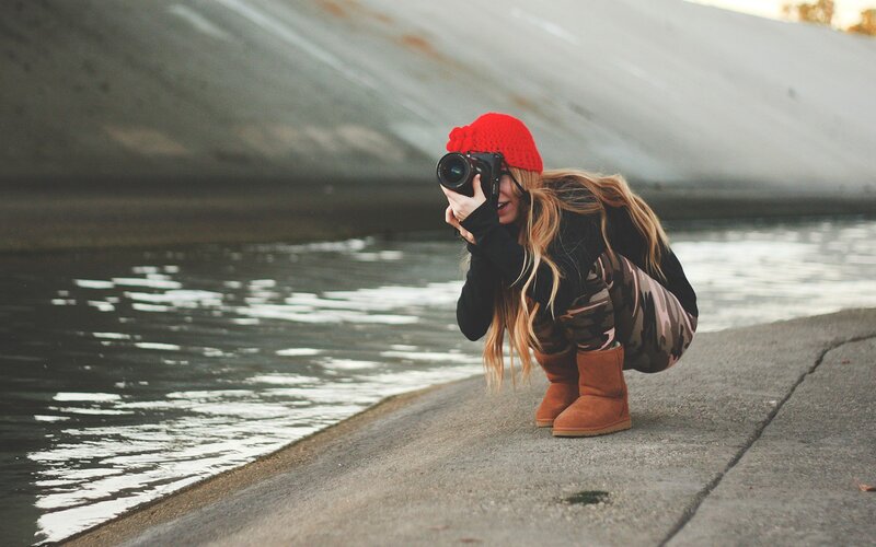 Photographer by the water
