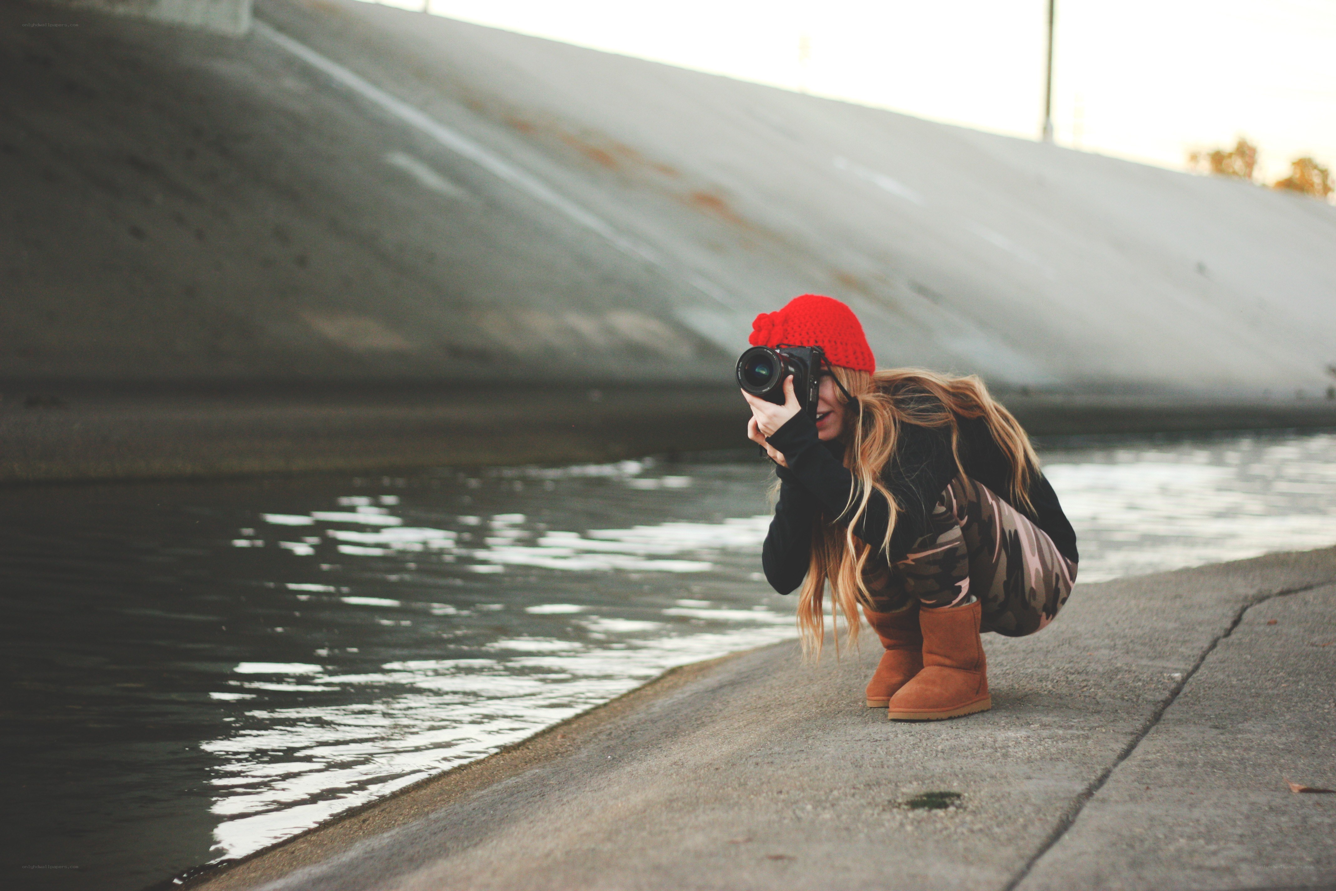 Photographer by the water