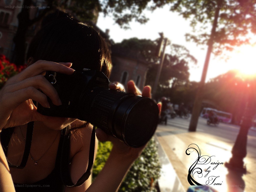 Photographer capturing sunset