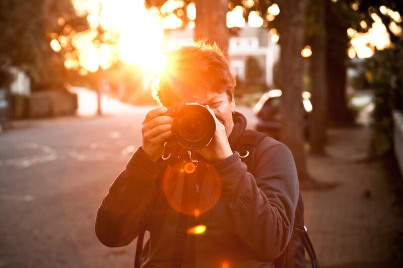 Photographer capturing sunset