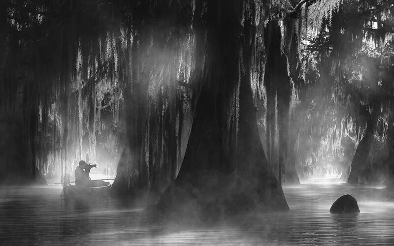 Photographer in a Canoe