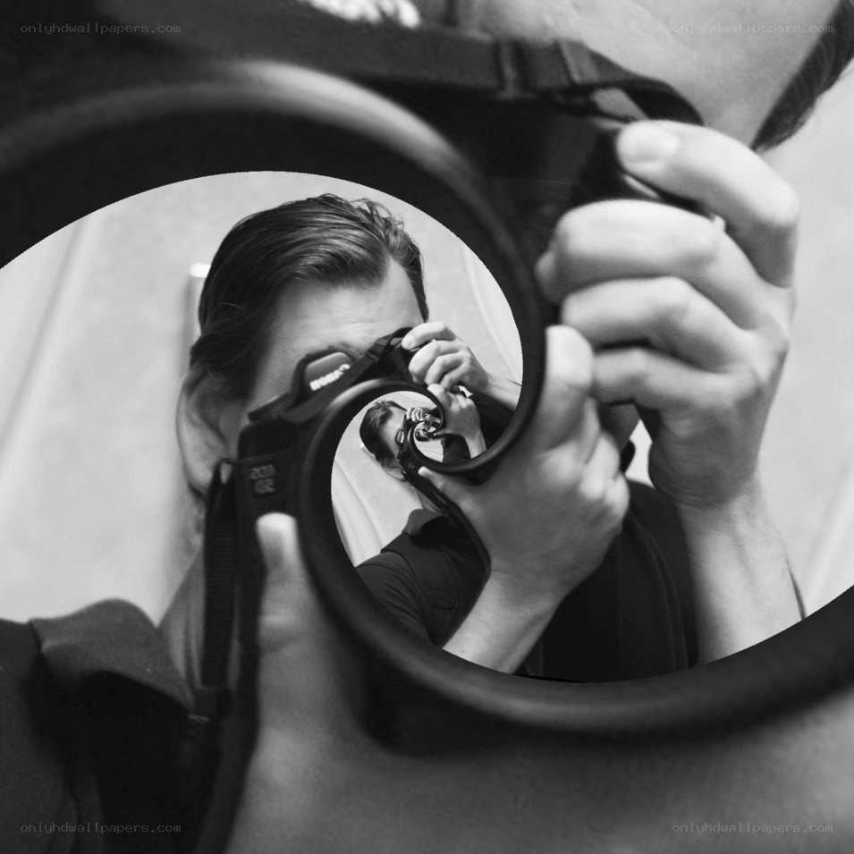 Photographer in a mirror reflection