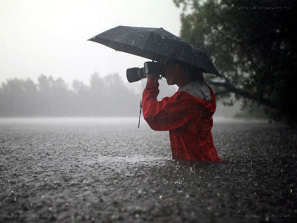 Photographer in the rain
