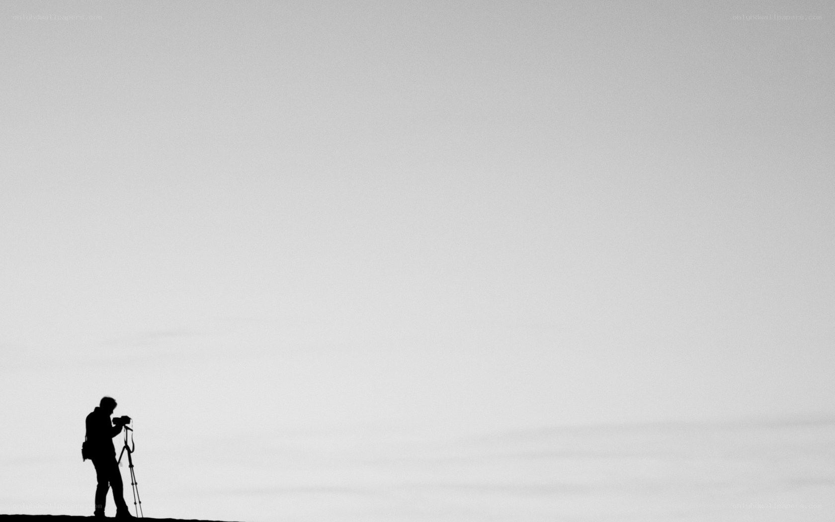 photographer on a hill