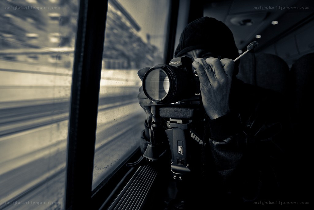 Photographer on a moving train