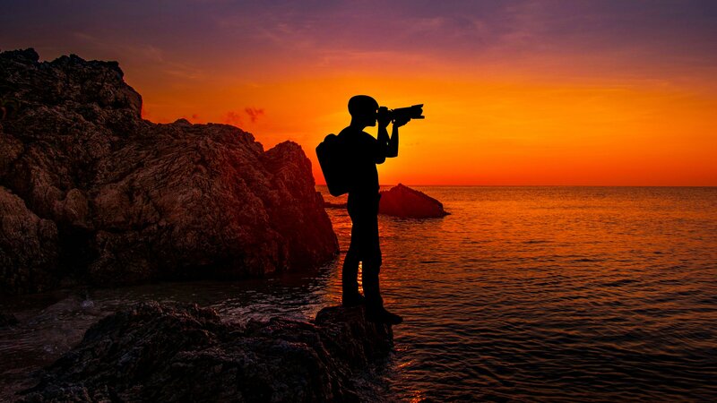 Photographer on Rocks