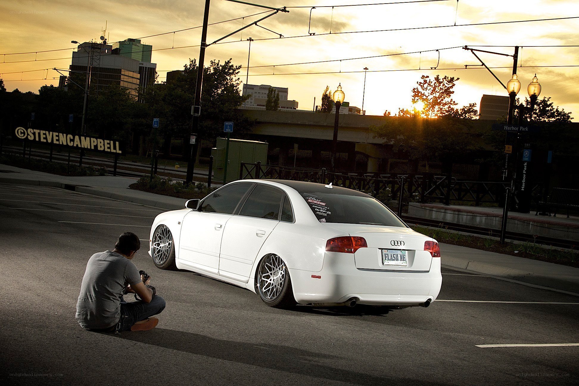 Photographer shooting a white Audi