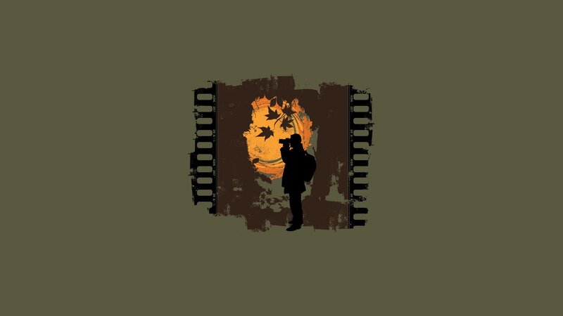Photographer silhouette at sunset