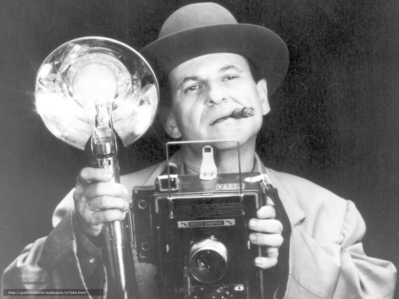 Photographer with camera and flash