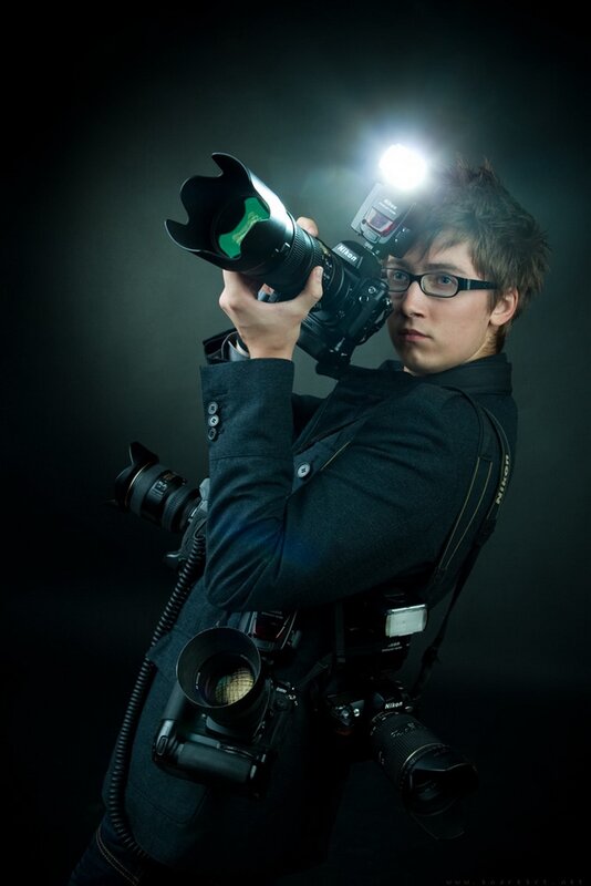 photographer with multiple cameras
