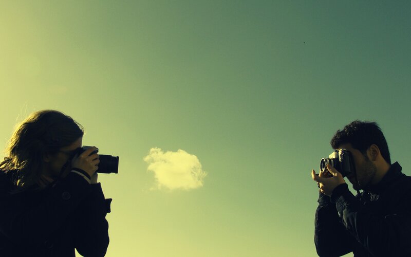 Photographers against the sky