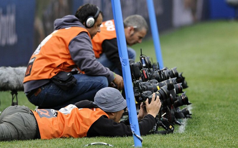 Photographers at a sports event