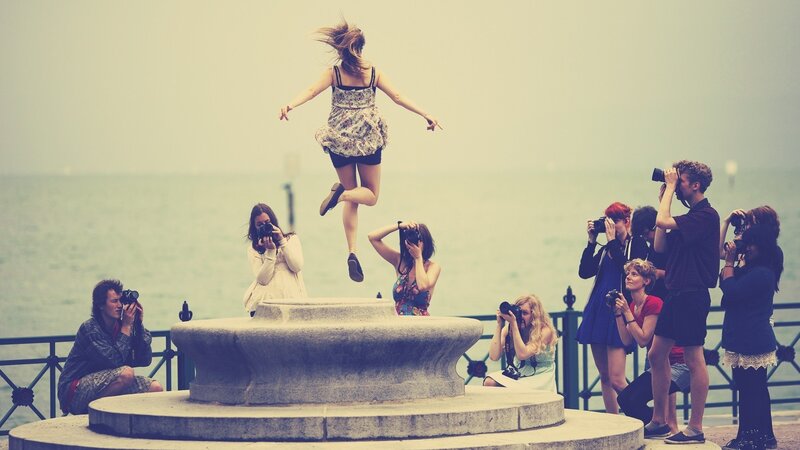 Photographers capturing a jump