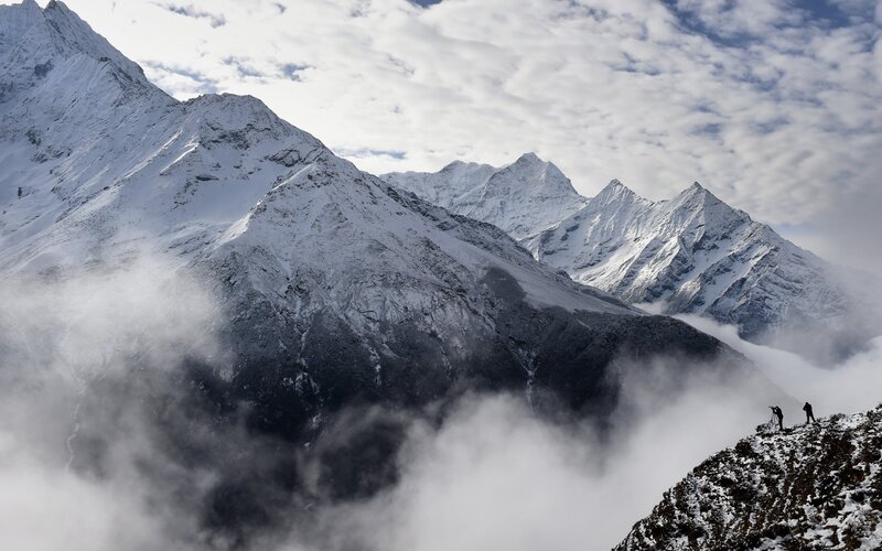 Photographers on Mountain Peak
