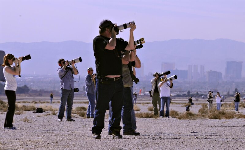 Photographers with Telephoto Lenses