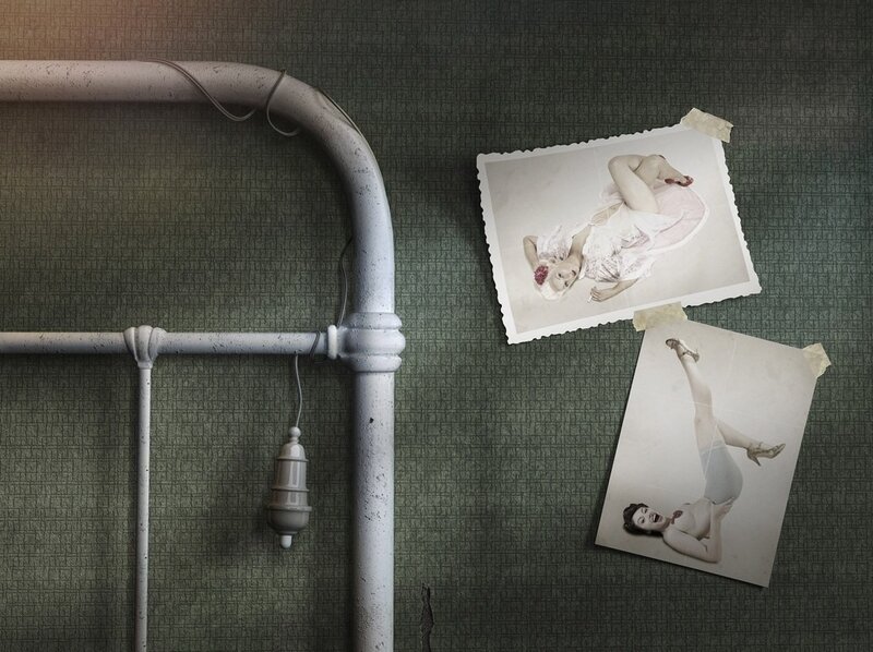 Photos on a wall with pipes