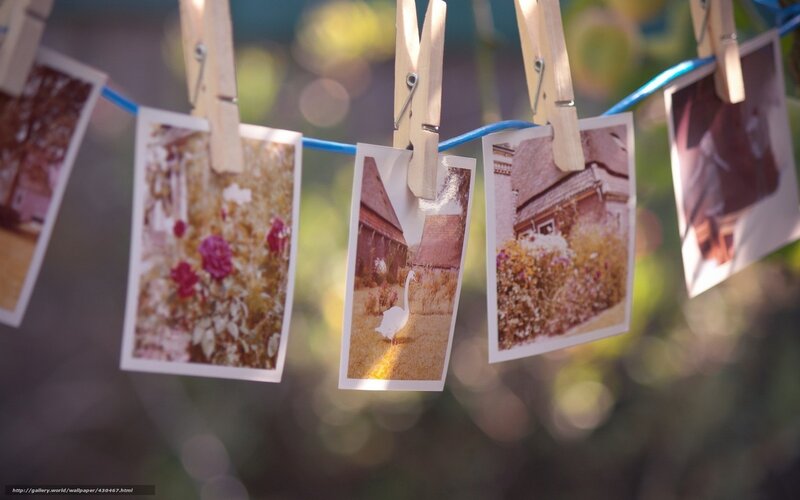 Photos on Clothesline — Blue, Serene, Afternoon