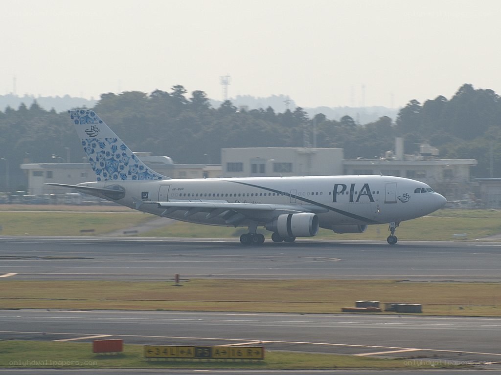PIA airplane on runway