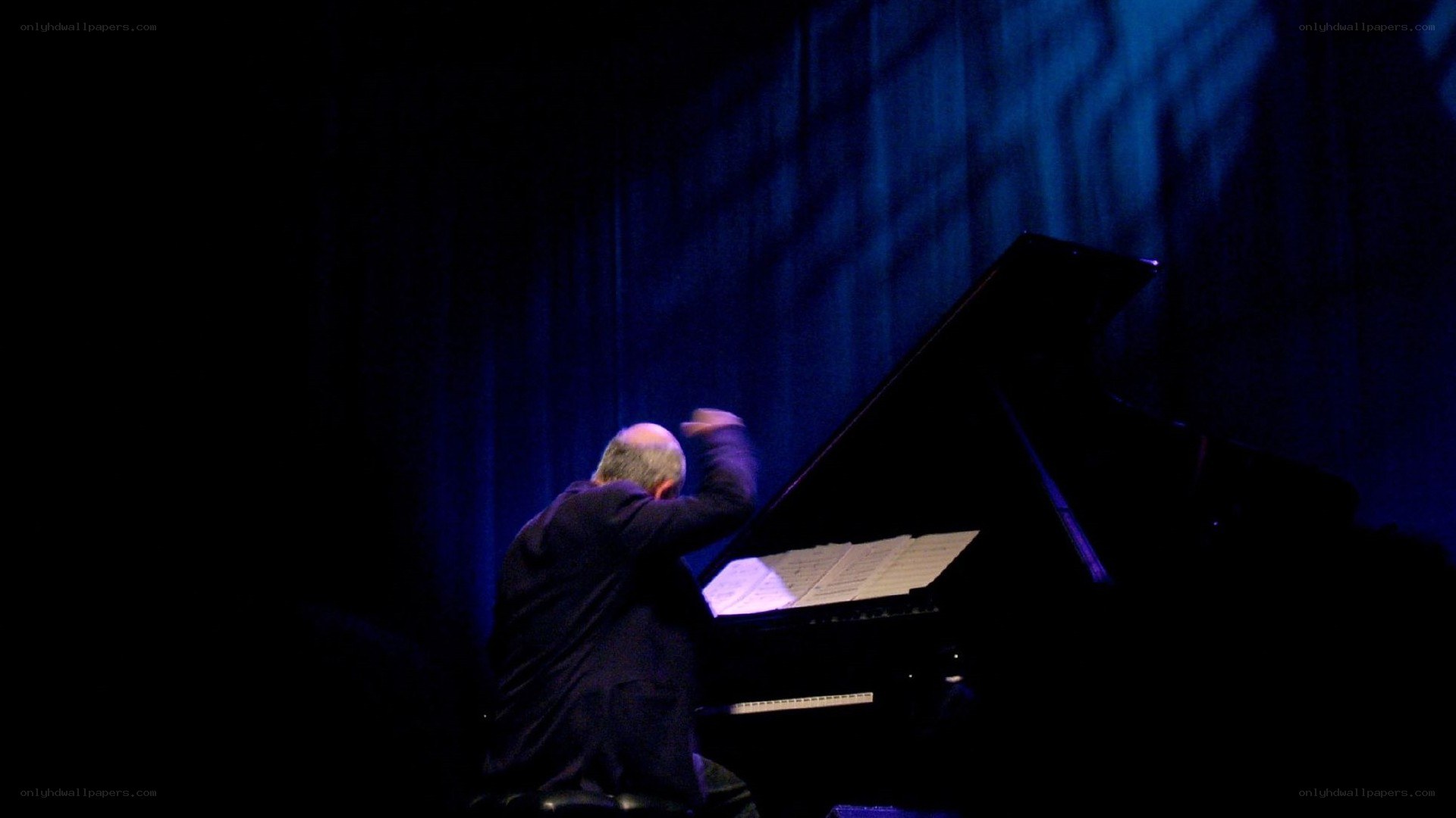 Pianist performing on stage
