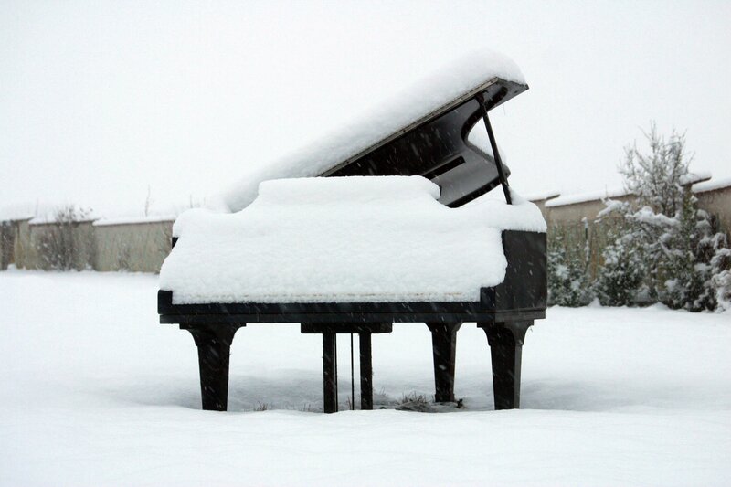 piano covered in snow