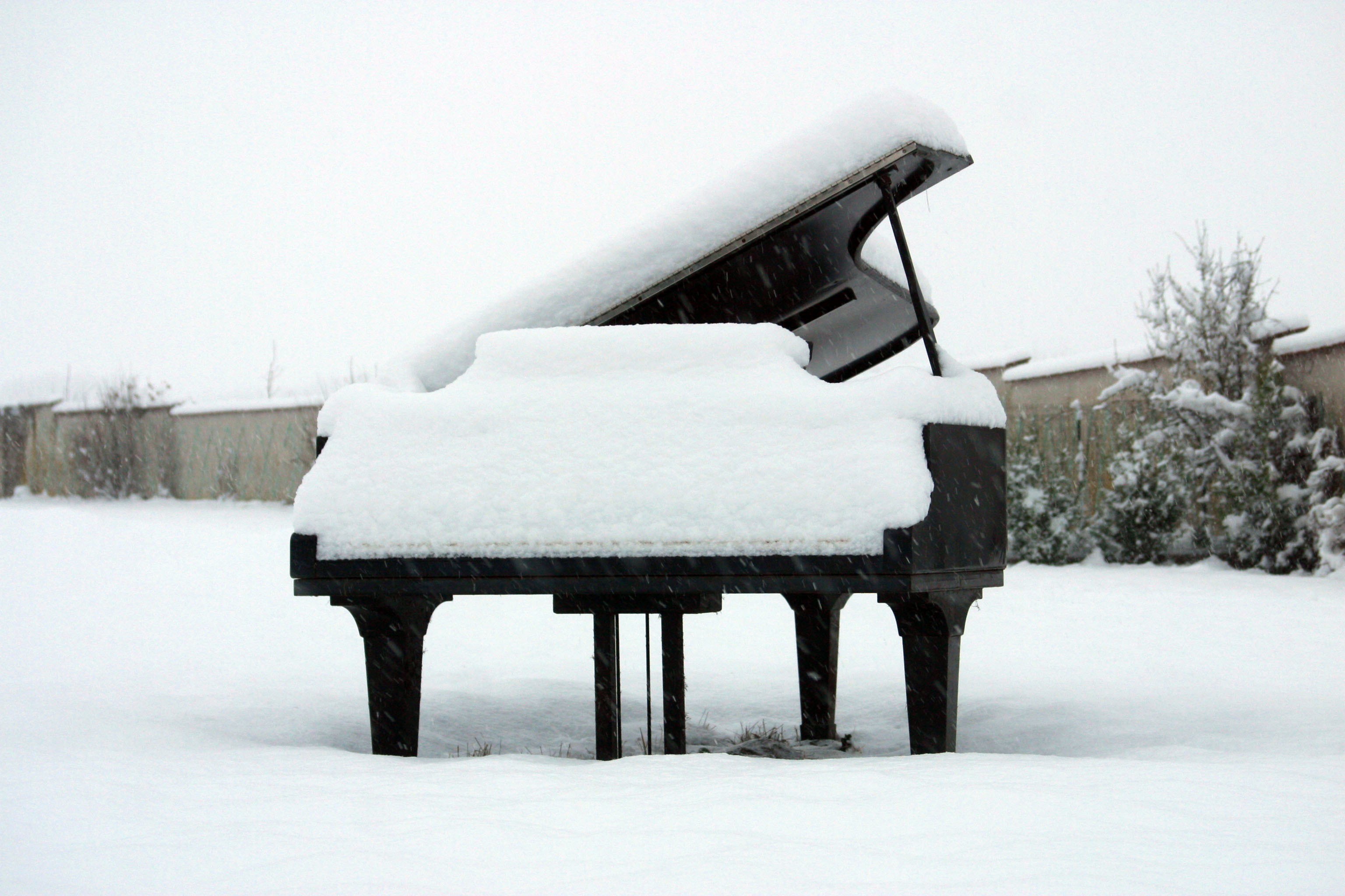 piano covered in snow