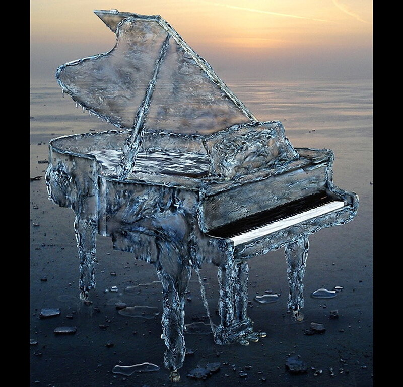 Piano frozen in ice on beach