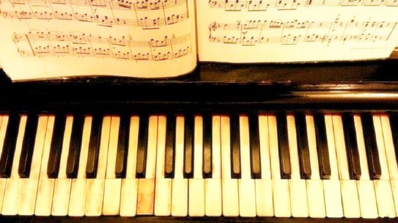 Piano Keyboard and Sheet Music
