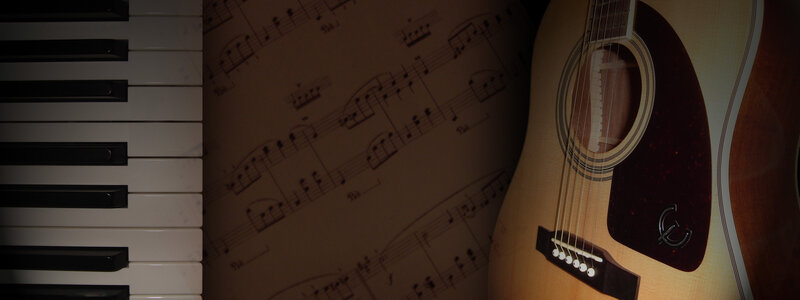 Piano keys and acoustic guitar