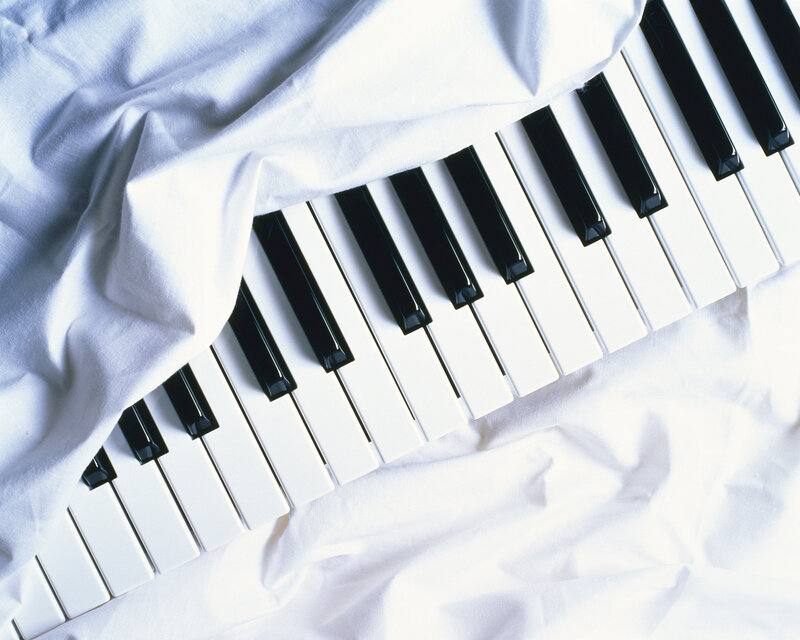 Piano Keys under Cloth