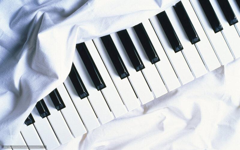 piano keys under white cloth