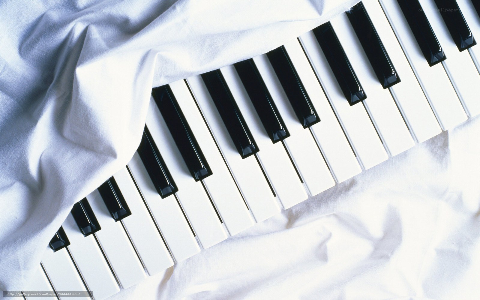 piano keys under white cloth