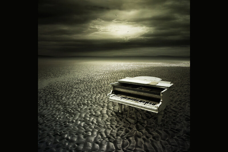 Piano on a desolate beach