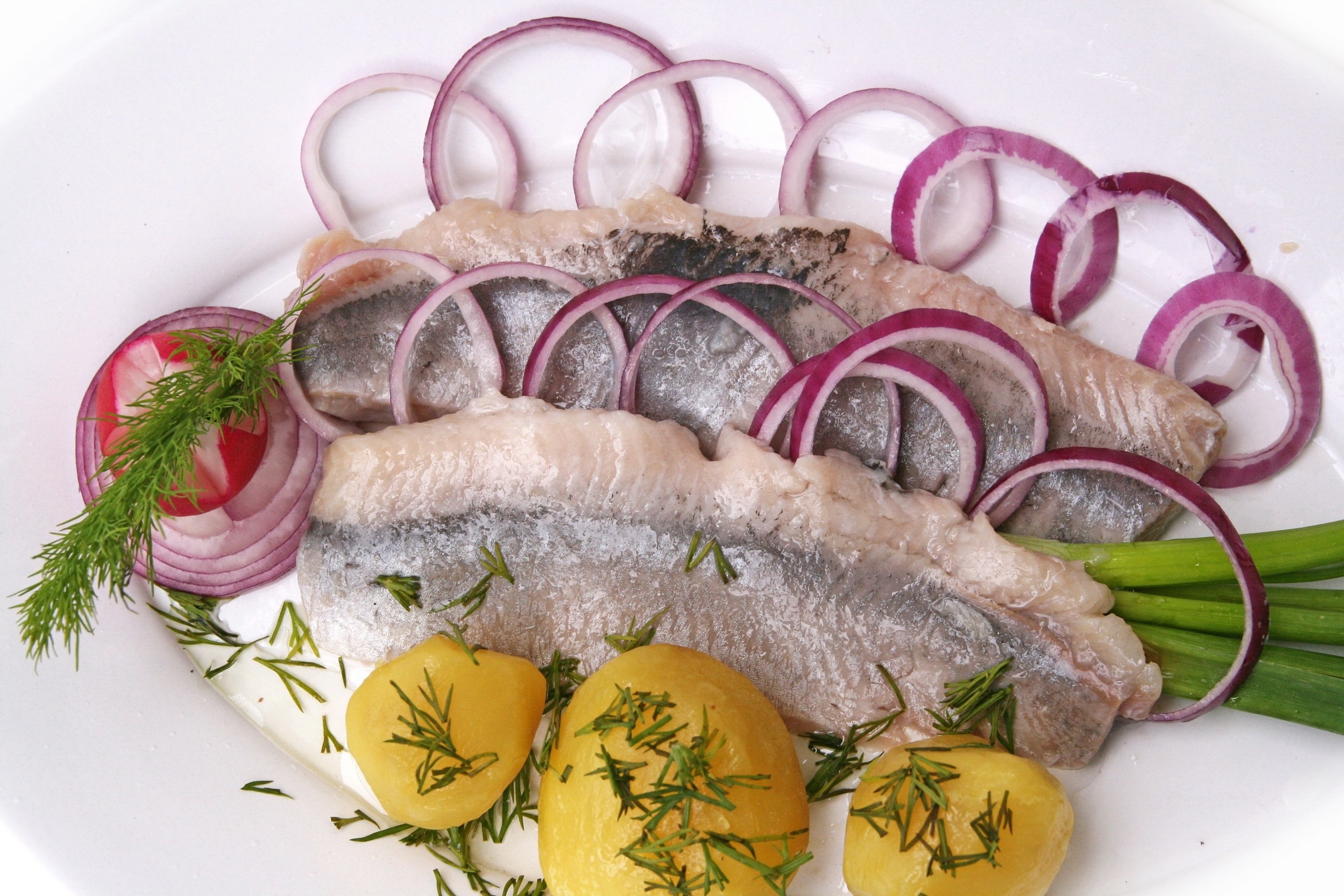 Pickled herring with onions and potatoes