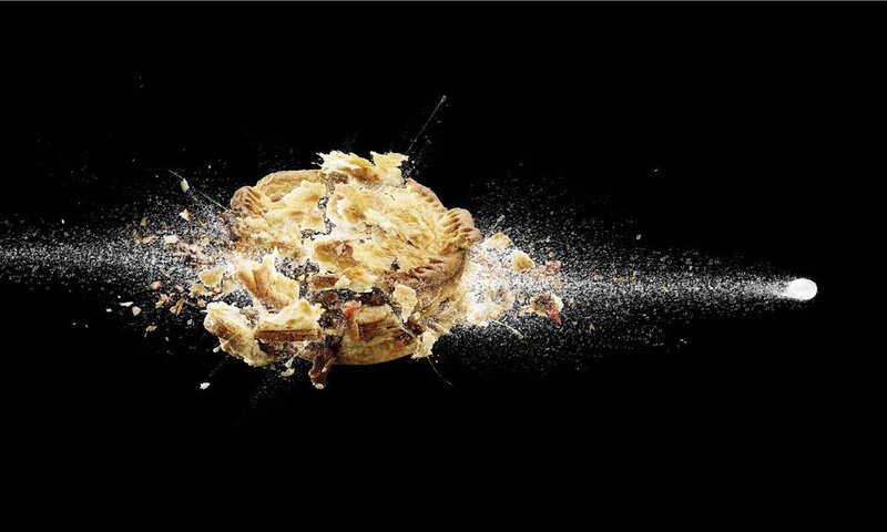 pie exploding in mid-air