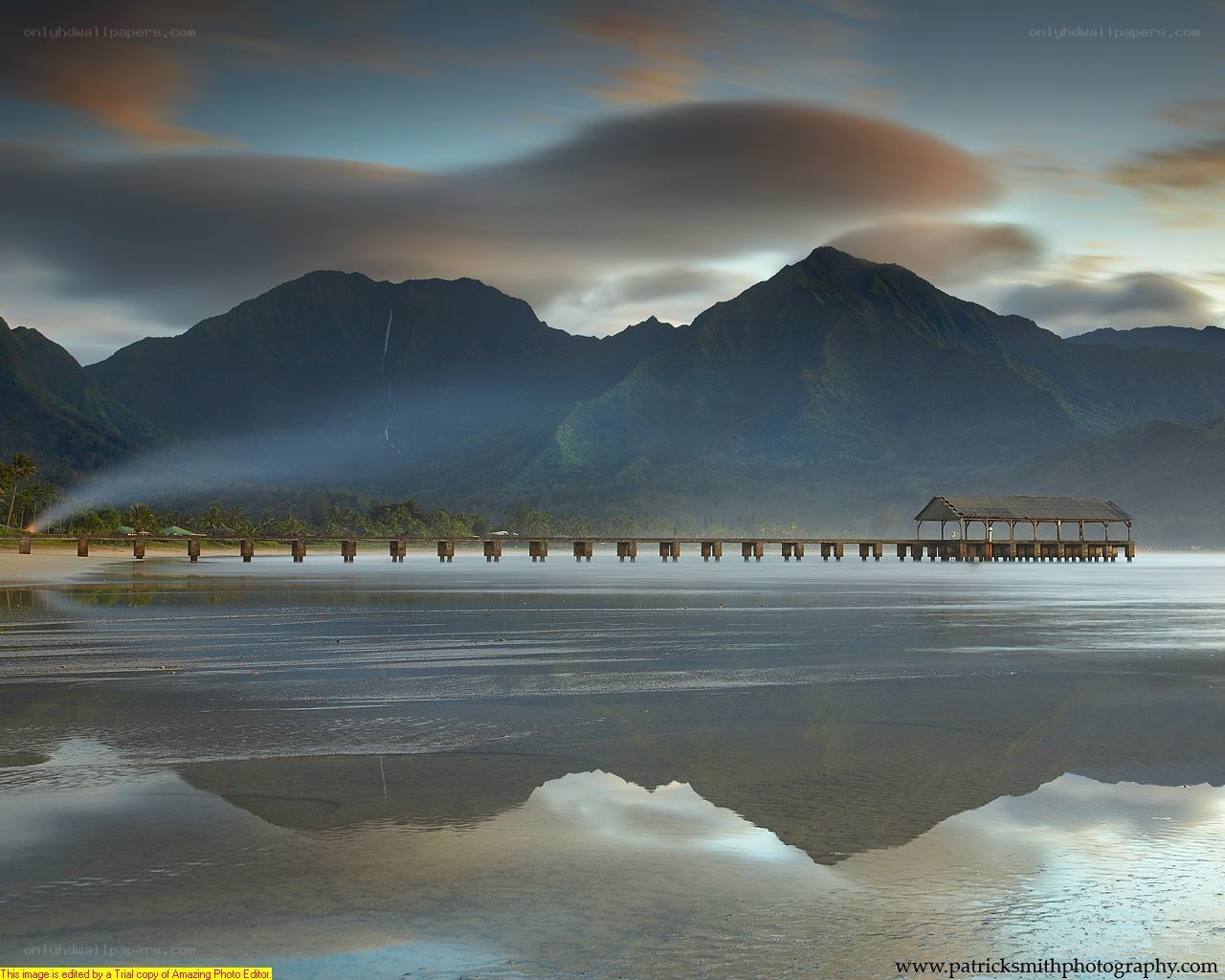 Pier and mountains at dawn
