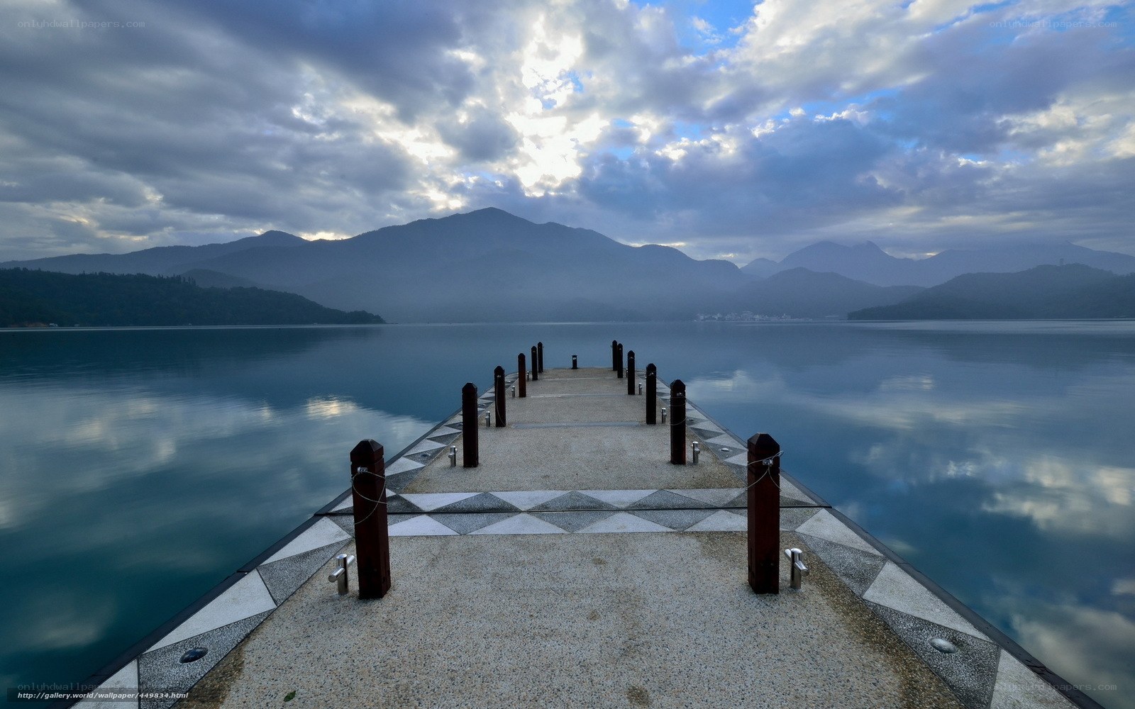 Pier at a misty lake