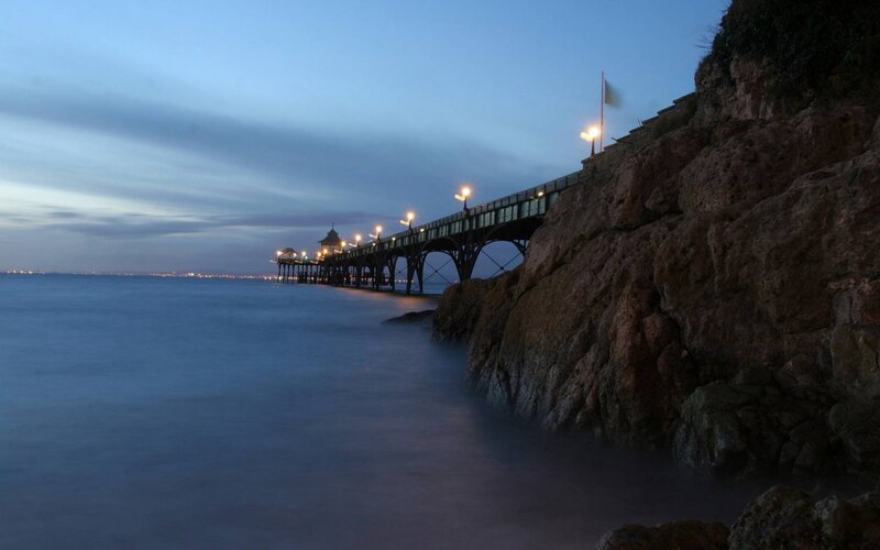 Pier at Dusk — Blue, Serene, Night, Photograph, Cliff