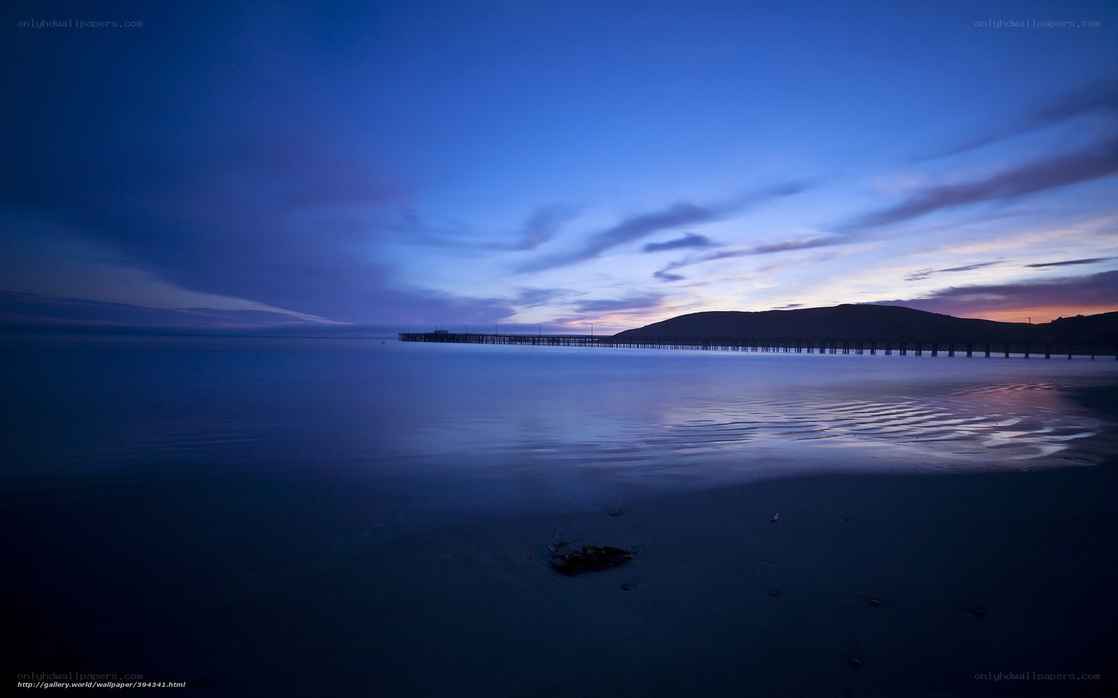 Pier at dusk by the sea