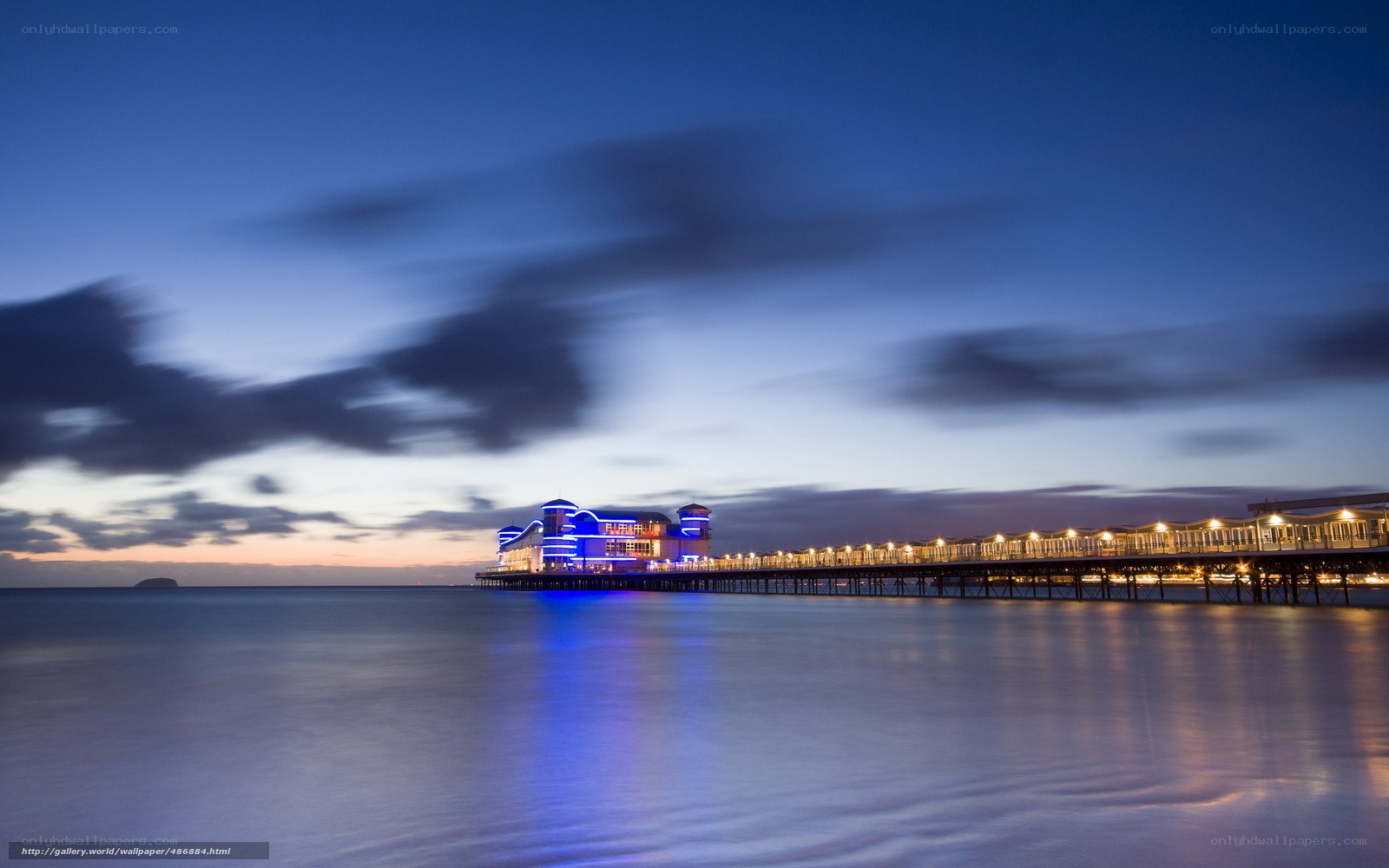Pier at dusk with blue lights