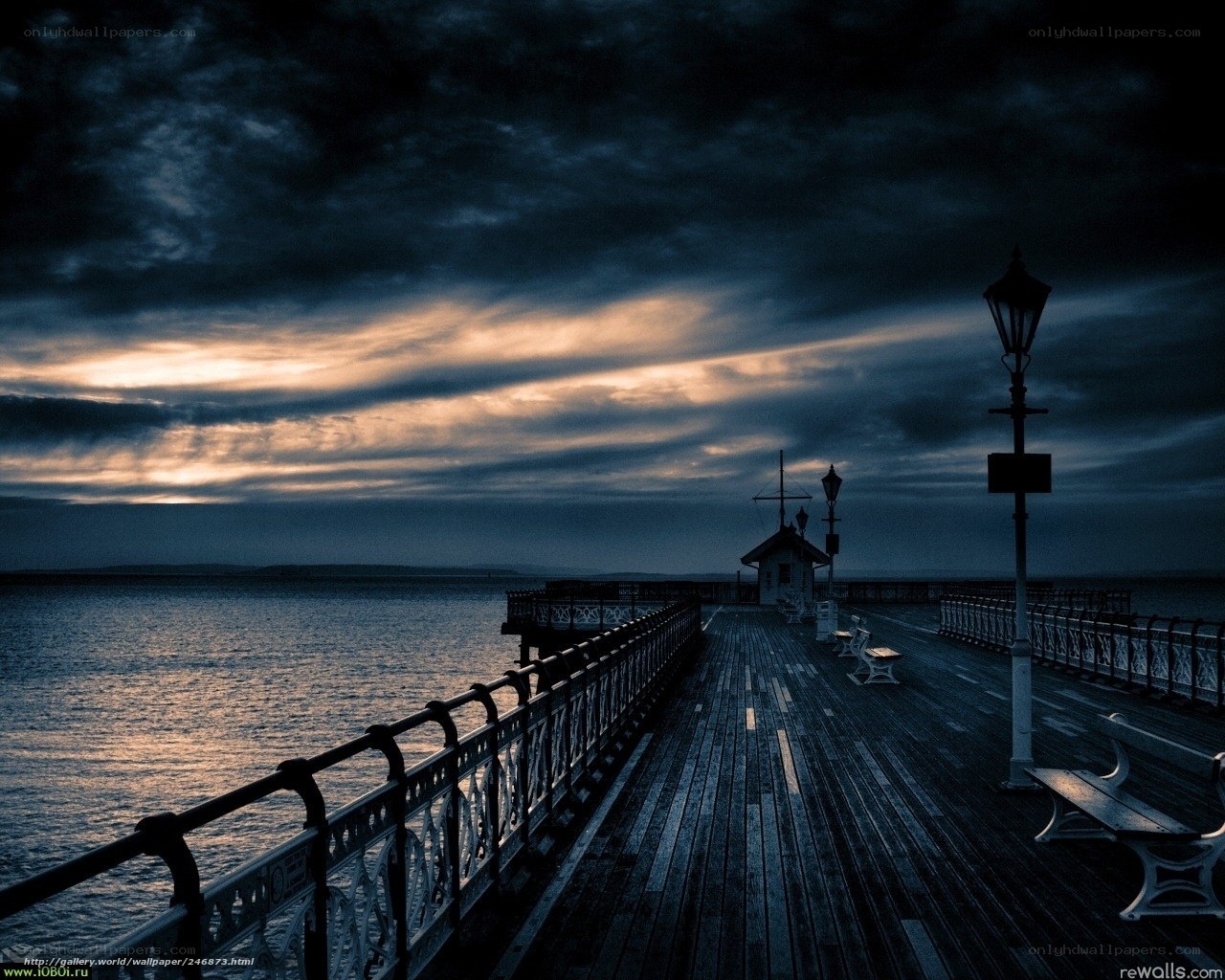 Pier at dusk with dramatic sky