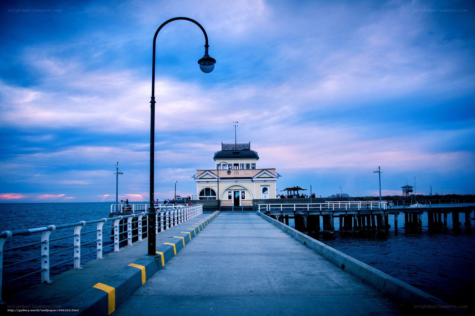 Pier at dusk with lamp post