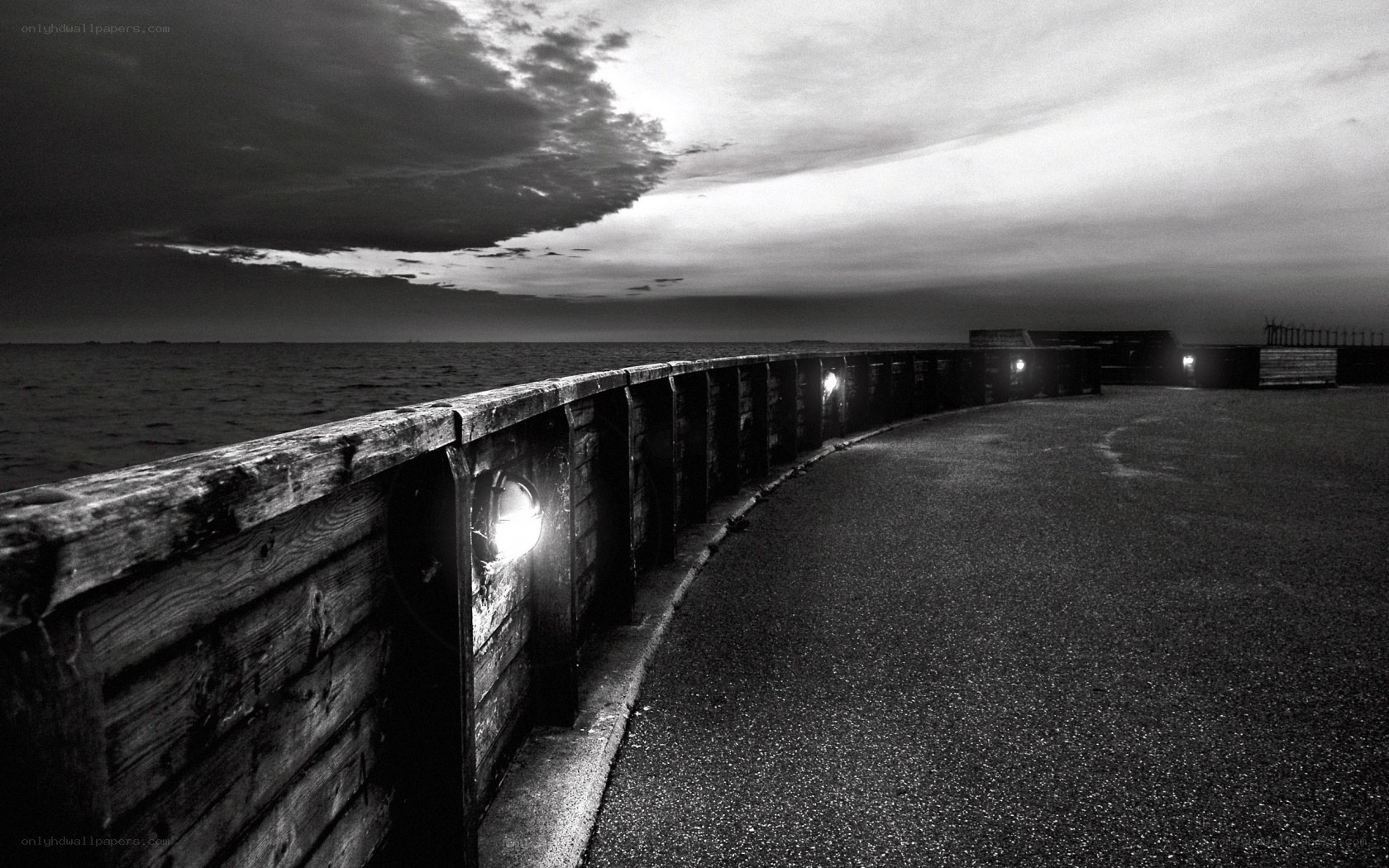 Pier at dusk with lights